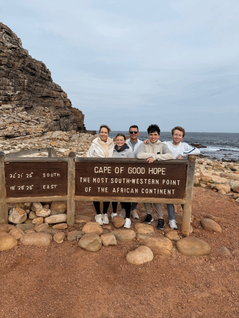 Family posing at the Cape of Good Hope during a Cape Peninsula tour.