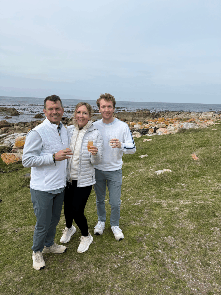Travelers enjoying panoramic views overlooking Cape Town, South Africa.