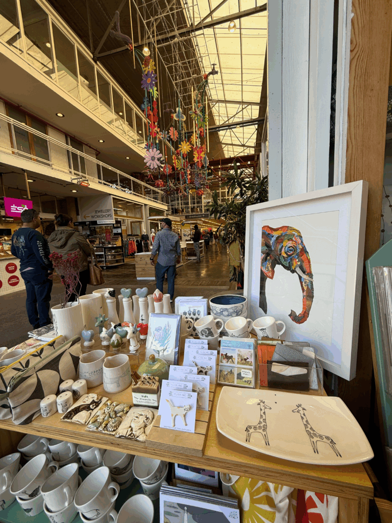 Handmade artisan market at Cape Town's V&A Waterfront featuring locally crafted gifts.